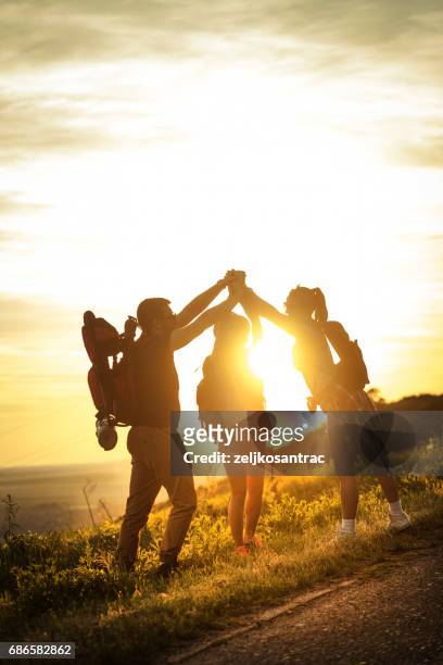 group of backpackers hiking - mountaineering team stock pictures, royalty-free photos & images