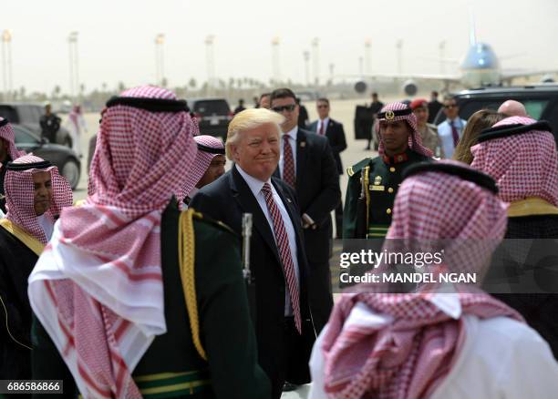 President Donald Trump makes his way to board Air Force One in Riyadh as he head with the First Lady to Israel on May 22, 2017.