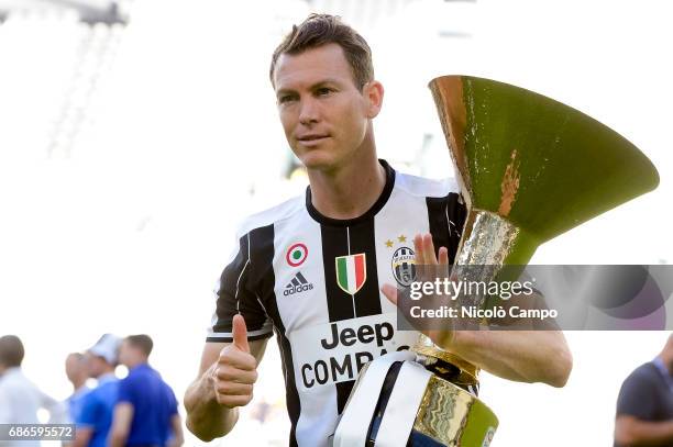 Stephan Lichtsteiner of Juventus FC celebrates the victory of the Italian Serie A 'Scudetto' at the end of the Serie A football match between...