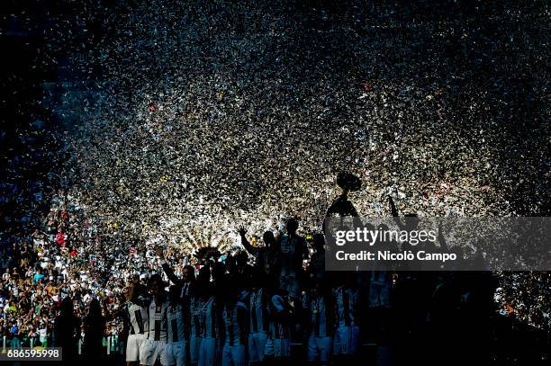 Juventus players celebrate the victory of the Italian Serie A 'Scudetto' at the end of the Serie A football match between Juventus FC and FC Crotone....