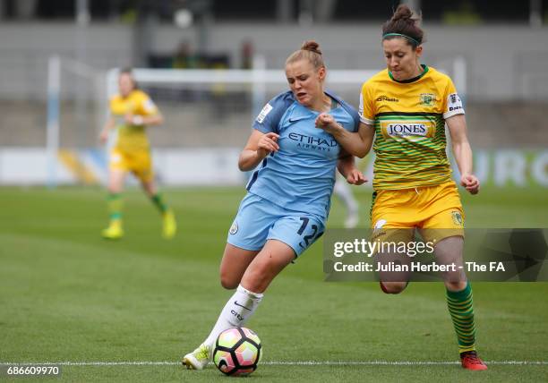 Georgia Stanway of Manchester City Women and Nicola Cousins of Yeovil Town Ladies chase the ball during the WSL Spring Series Match between...