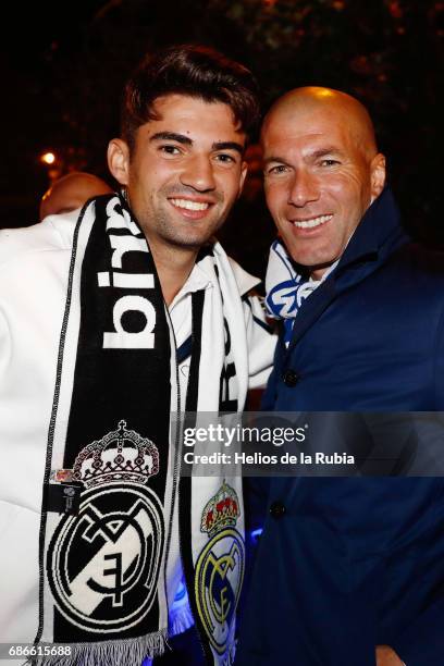 Head coach Zinedine Zidane and Enzo Zidane of Real Madrid celebrate during celebrations at Cibeles Fountain after winning the 2016/17 Spanish...