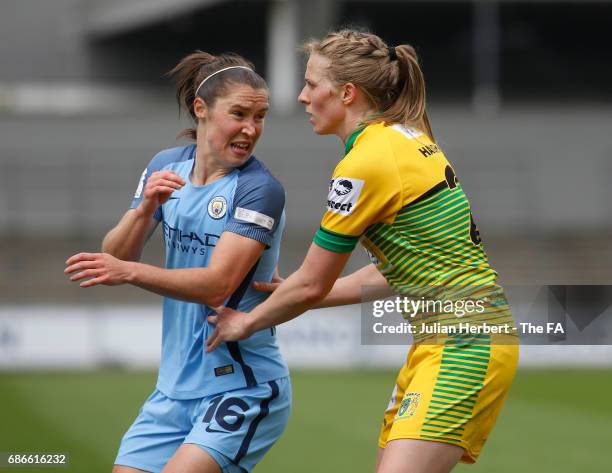 Jane Ross of Manchester City Women and Natalie Haigh of of Yeovil Town Ladies in action during the WSL Spring Series Match between Manchester City...