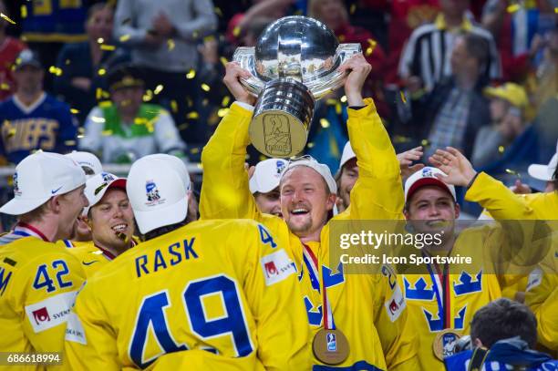 Anton Stralman celebrates with the trophy during the Ice Hockey World Championship Gold medal game between Canada and Sweden at Lanxess Arena in...