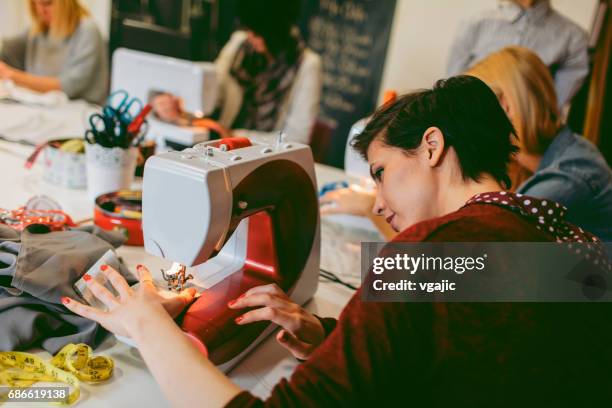 sewing class - textile class stock pictures, royalty-free photos & images