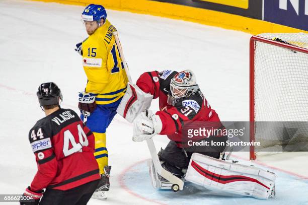 Oscar Lindberg tries to score against Goalie Calvin Pickard during the Ice Hockey World Championship Gold medal game between Canada and Sweden at...