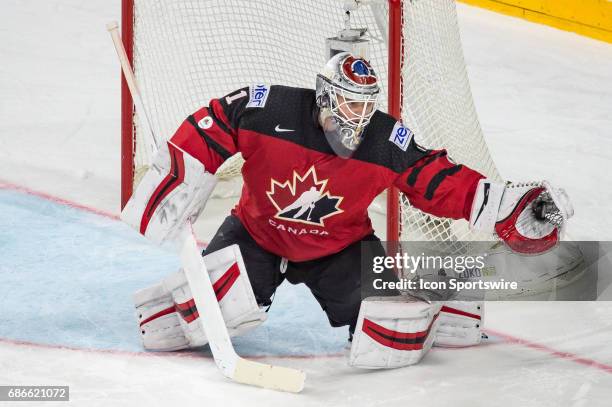Goalie Calvin Pickard makes a glove save during the Ice Hockey World Championship Gold medal game between Canada and Sweden at Lanxess Arena in...