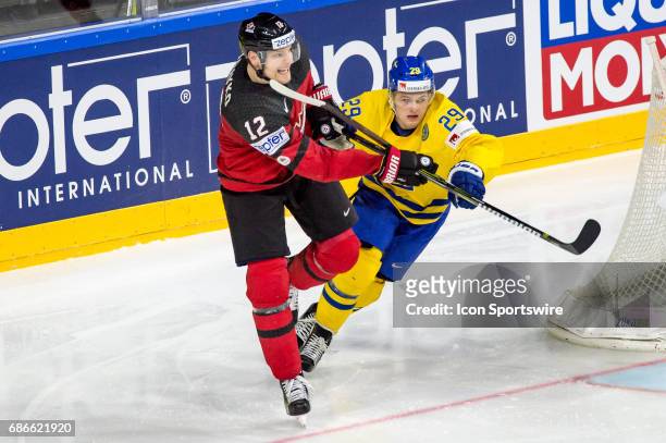 Colton Parayko vies with William Nylander during the Ice Hockey World Championship Gold medal game between Canada and Sweden at Lanxess Arena in...
