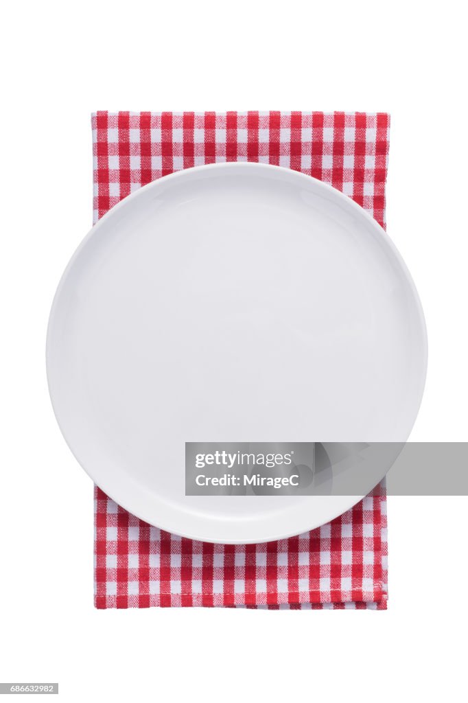 White Plate on Red Checked Pattern Tablecloth