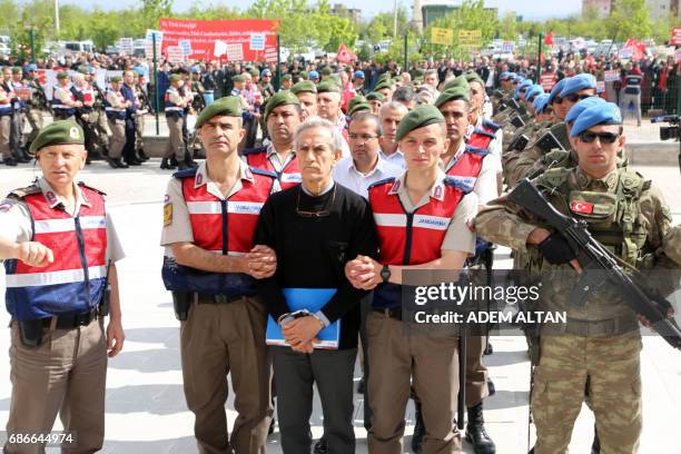Turkish Gendarmerie escort defendants Akin Ozturk and others involved in last Julys attempted coup in Turkey as they leave the prison where they are...