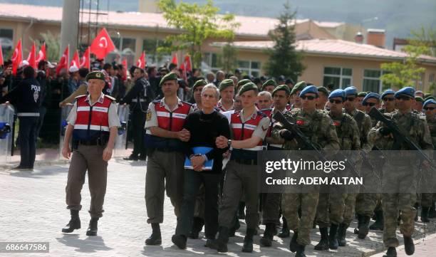 Turkish Gendarmerie escort defendants Akin Ozturk and others involved in last Julys attempted coup in Turkey as they leave the prison where they are...