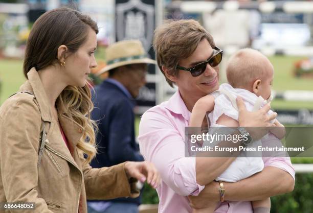 The Venezuelan singer Carlos Baute, his wife Astrid Klisans and their son Markuss Baute attend the Global Champions Tour tournament on May 21, 2017...