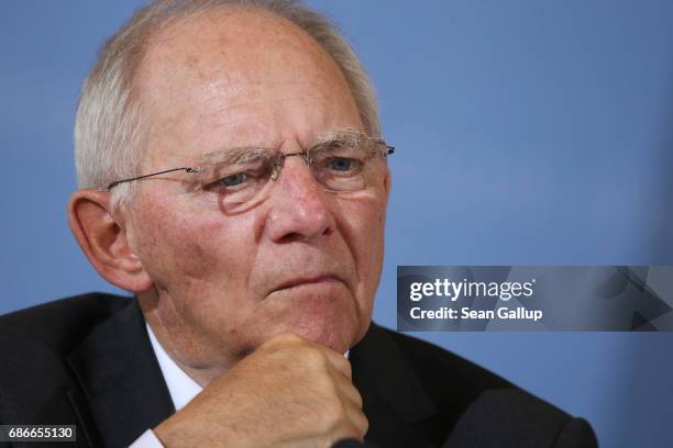 German Finance Minister Wolfgang Schaeuble and new French Finance Minister Bruno Le Maire speak to the media following talks on May 22, 2017 in...