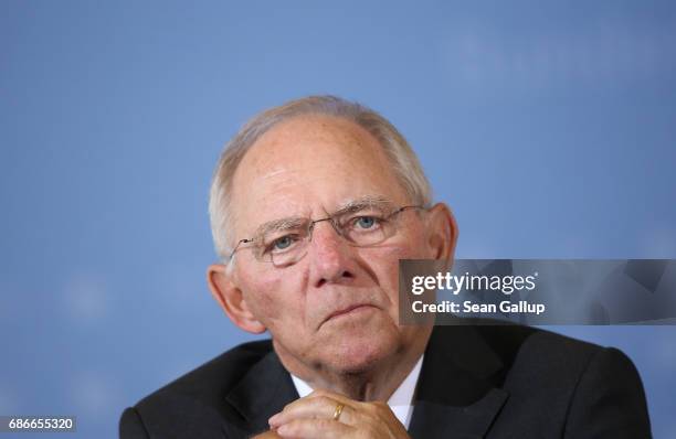 German Finance Minister Wolfgang Schaeuble and new French Finance Minister Bruno Le Maire speak to the media following talks on May 22, 2017 in...