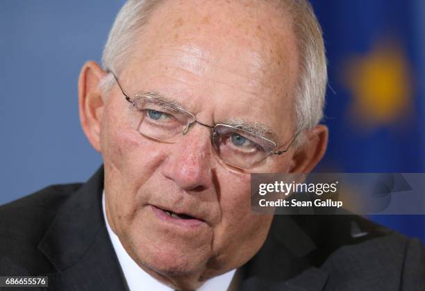 German Finance Minister Wolfgang Schaeuble and new French Finance Minister Bruno Le Maire speak to the media following talks on May 22, 2017 in...