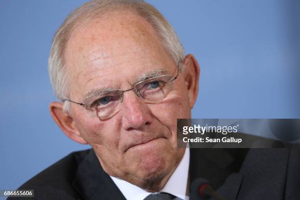 German Finance Minister Wolfgang Schaeuble and new French Finance Minister Bruno Le Maire speak to the media following talks on May 22, 2017 in...