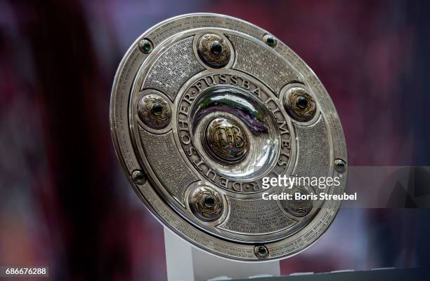 The Meisterschale is pictured prior to the Bundesliga match between Bayern Muenchen and SC Freiburg at Allianz Arena on May 20, 2017 in Munich,...