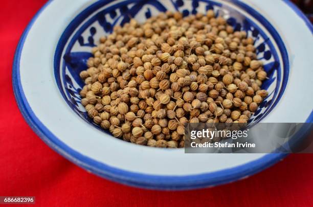 Bowls of coriander seeds acts as a centrepiece to decorate a dinner table at a private kitchen in Hong kong.