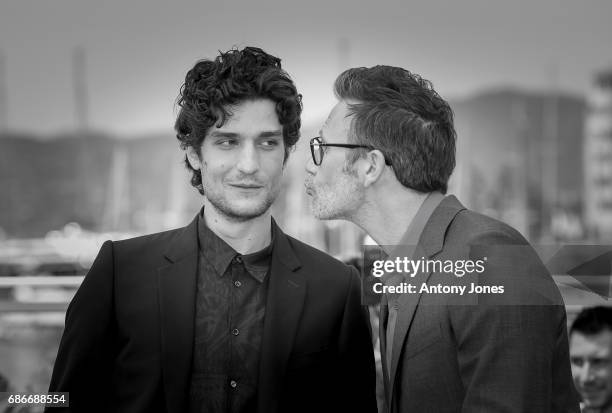 Actor Louis Garrel and director Michel Hazanavicius attend the 'Redoutable ' photocall during the 70th annual Cannes Film Festival at on May 21, 2017...