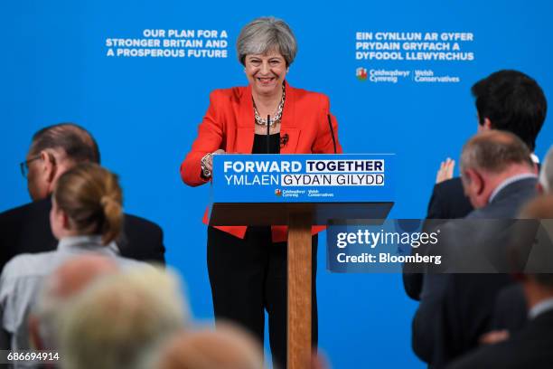 Theresa May, U.K. Prime minister and leader of the Conservative Party, reacts during the launch of the Welsh Conservative general election manifesto...