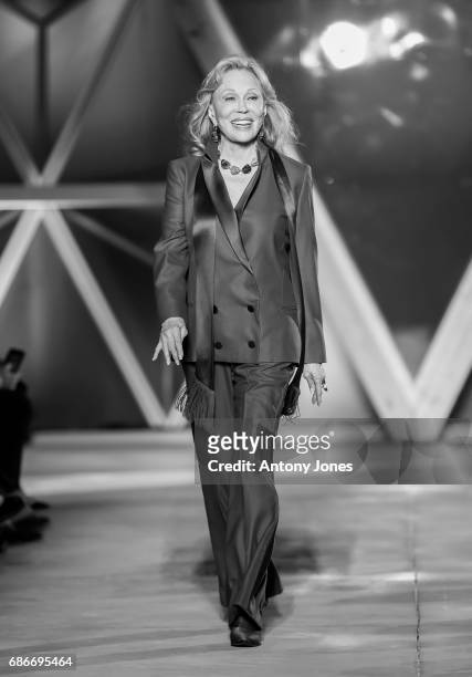 Faye Dunaway walks the runway at the Fashion for Relief event during the 70th annual Cannes Film Festival at Aeroport Cannes Mandelieu on May 21,...