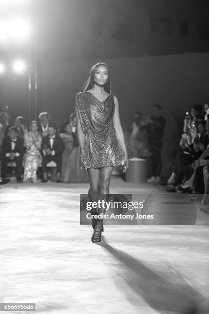 Naomi Campbell walks the runway at the Fashion for Relief event during the 70th annual Cannes Film Festival at Aeroport Cannes Mandelieu on May 21,...