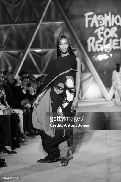 Naomi Campbell walks the runway at the Fashion for Relief event during the 70th annual Cannes Film Festival at Aeroport Cannes Mandelieu on May 21,...