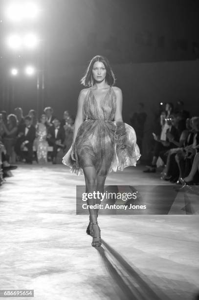 Bella Hadid walks the runway at the Fashion for Relief event during the 70th annual Cannes Film Festival at Aeroport Cannes Mandelieu on May 21, 2017...