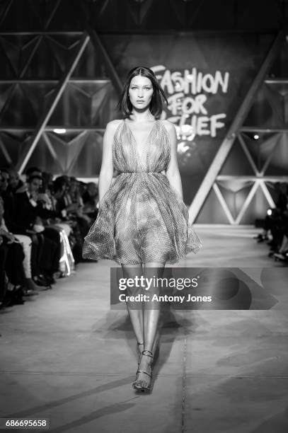 Bella Hadid walks the runway at the Fashion for Relief event during the 70th annual Cannes Film Festival at Aeroport Cannes Mandelieu on May 21, 2017...