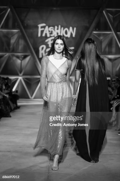 Kendall Jenner walks the runway at the Fashion for Relief event during the 70th annual Cannes Film Festival at Aeroport Cannes Mandelieu on May 21,...