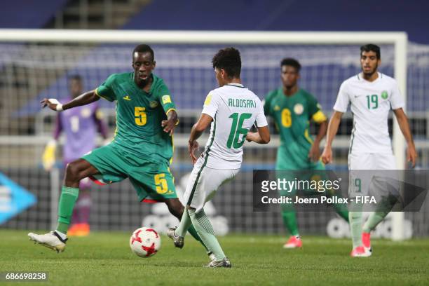 Abdulrahman Aldosari of Saudi Arabia and Cavin Diagne of Senegal compete for the ball during the FIFA U-20 World Cup Korea Republic 2017 group F...
