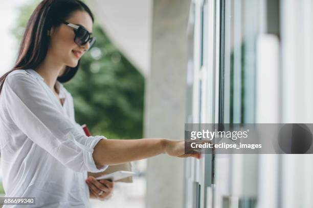 woman hand opening door - retail store opening stock pictures, royalty-free photos & images