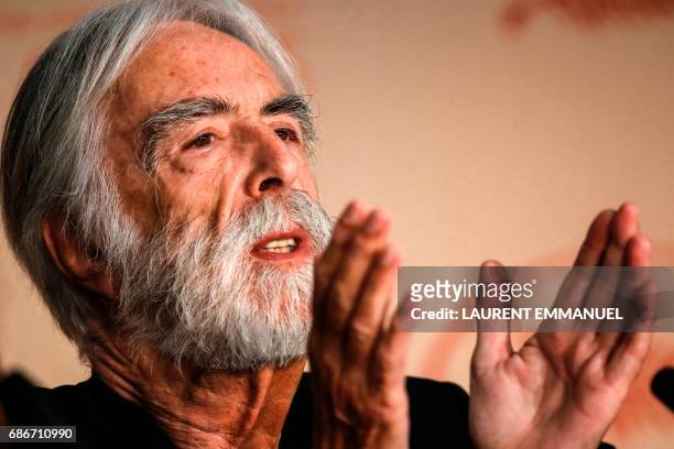 Austrian director Michael Haneke talks on May 22, 2017 during a press conference for the film 'Happy End' at the 70th edition of the Cannes Film...