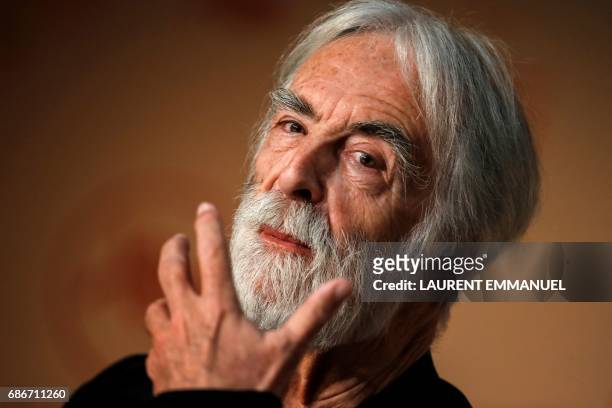 Austrian director Michael Haneke attends on May 22, 2017 a press conference for the film 'Happy End' at the 70th edition of the Cannes Film Festival...