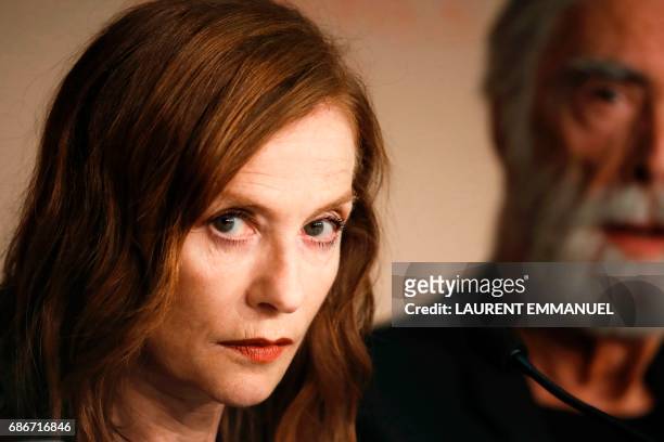 French actress Isabelle Huppert, and Austrian director Michael Haneke, attend on May 22, 2017 a press conference for the film 'Happy End' at the 70th...