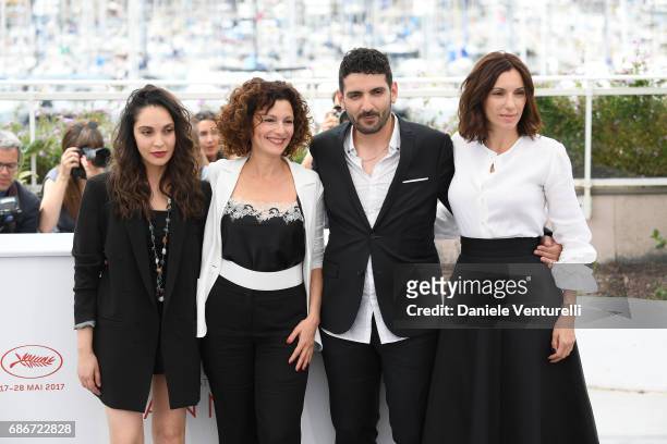 Actors Hania Amar, Nadia Kaci, Karim Moussaoui and Aure Atika attend "Waiting For Swallows " photocall during the 70th annual Cannes Film Festival at...