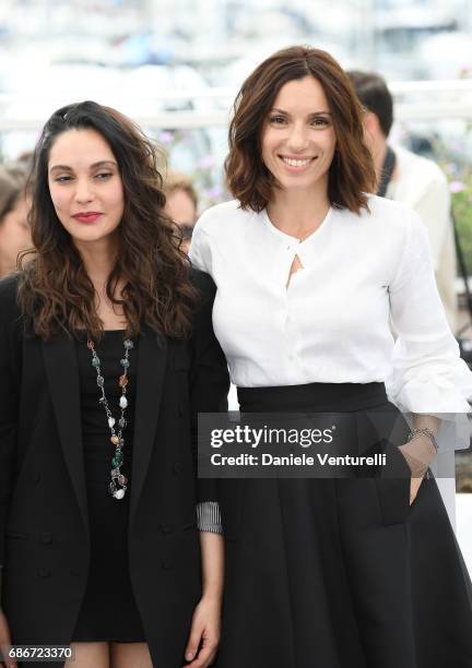 Actresses Hania Amar and Aure Atika attend "Waiting For Swallows " photocall during the 70th annual Cannes Film Festival at Palais des Festivals on...
