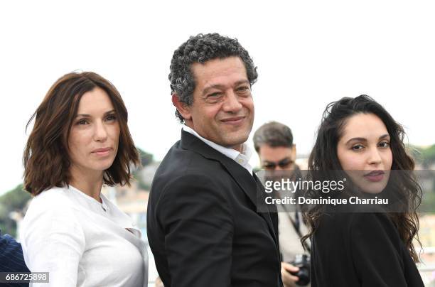 Actors Aure Atika, Hassan Kachach and Hania Amar attend "Waiting For Swallows " photocall during the 70th annual Cannes Film Festival at Palais des...