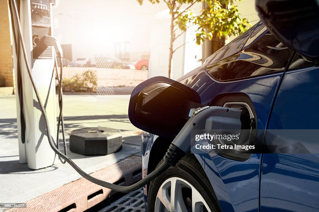 Electric car recharging in charging station