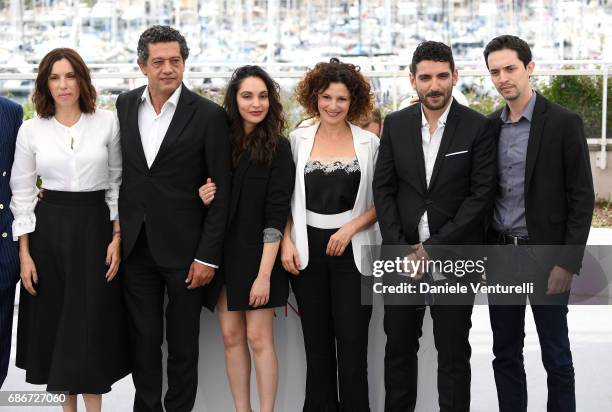 Actors Aure Atika, Hassan Kachach, Hania Amar, Nadia Kaci, director Karim Moussaoui and actor Mehdi Ramdani attend "Waiting For Swallows " photocall...