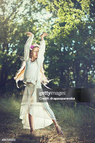 girl dancing in the woods - hippies stock pictures, royalty-free photos & images