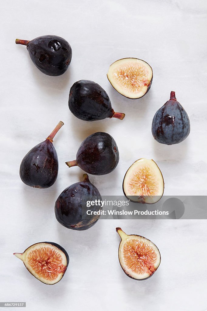 Figs lying on marble table