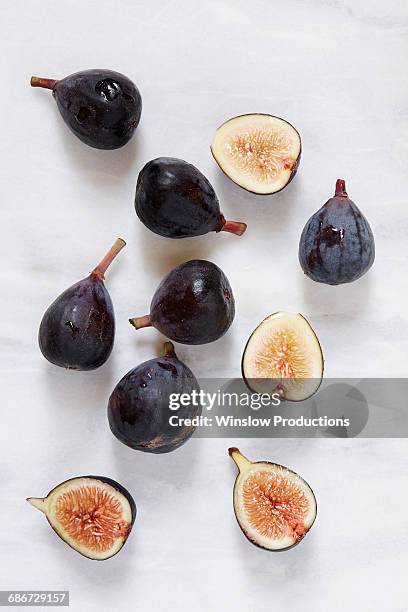 figs lying on marble table - fig bildbanksfoton och bilder