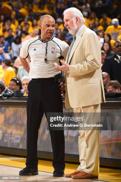 Referee, Dan Crawford and Gregg Popovich of the San Antonio Spurs talk in Game One of the Western Conference Finals against the Golden State Warriors...