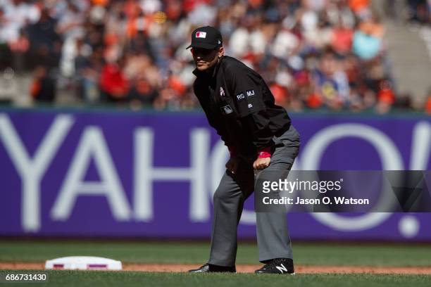 Umpire Mark Wegner stands on the field during the ninth inning between the San Francisco Giants and the Cincinnati Reds at AT&T Park on May 14, 2017...