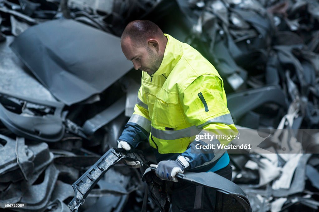 Man working at recycling yard