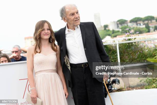 Fantine Harduin and Jean-Louis Trintignant attend the "Happy End" photocall during the 70th annual Cannes Film Festival at Palais des Festivals on...