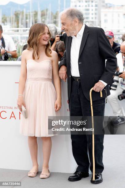 Fantine Harduin and Jean-Louis Trintignant attend the "Happy End" photocall during the 70th annual Cannes Film Festival at Palais des Festivals on...