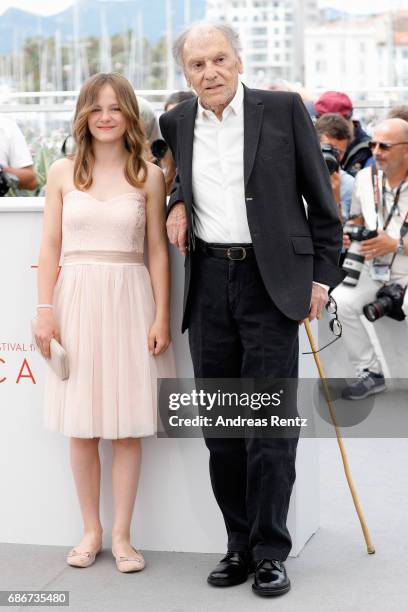 Fantine Harduin and Jean-Louis Trintignant attend the "Happy End" photocall during the 70th annual Cannes Film Festival at Palais des Festivals on...