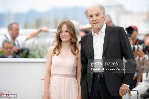 Fantine Harduin and Jean-Louis Trintignant attend the "Happy End" photocall during the 70th annual Cannes Film Festival at Palais des Festivals on...